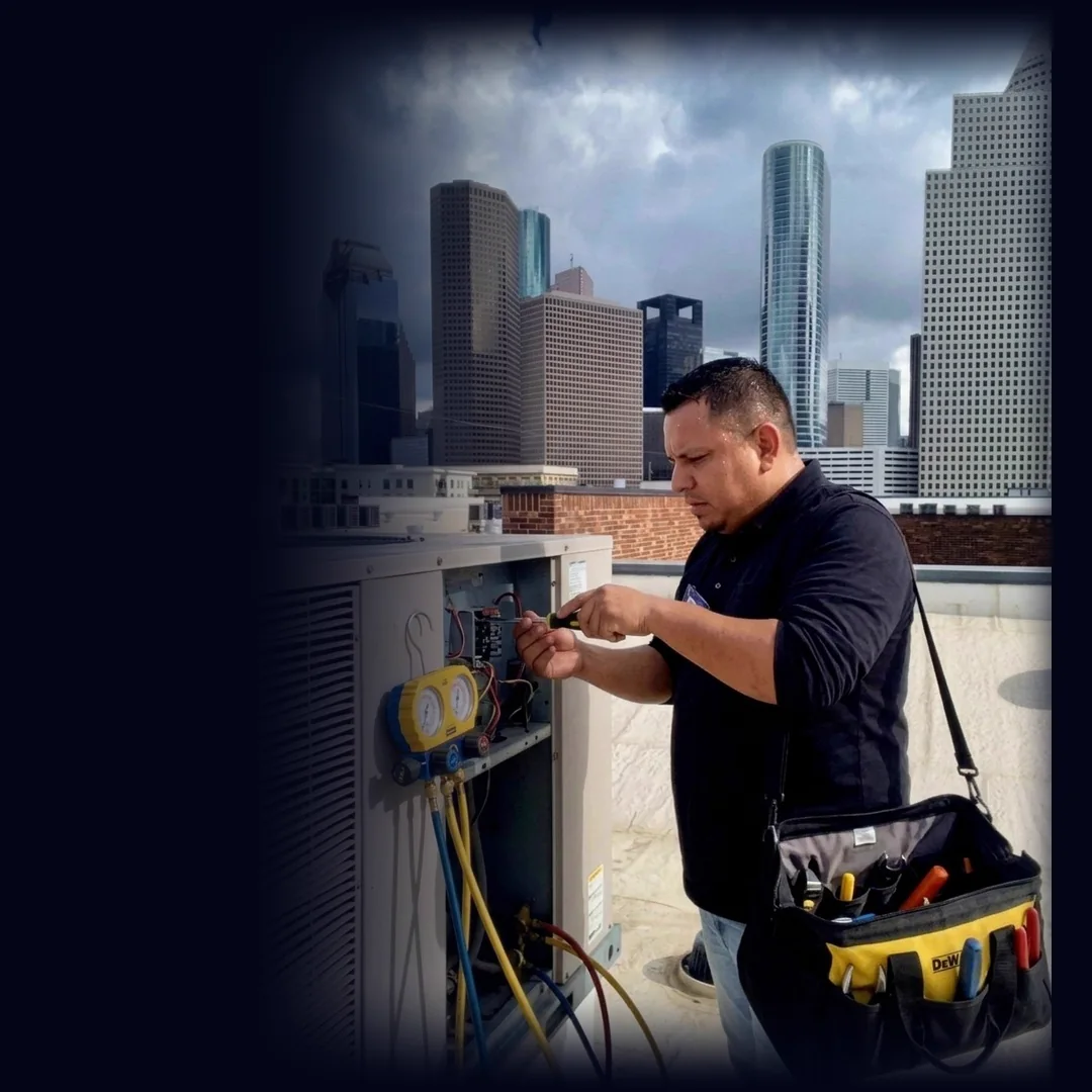 Martin Lopez working on an HVAC unit in Houston